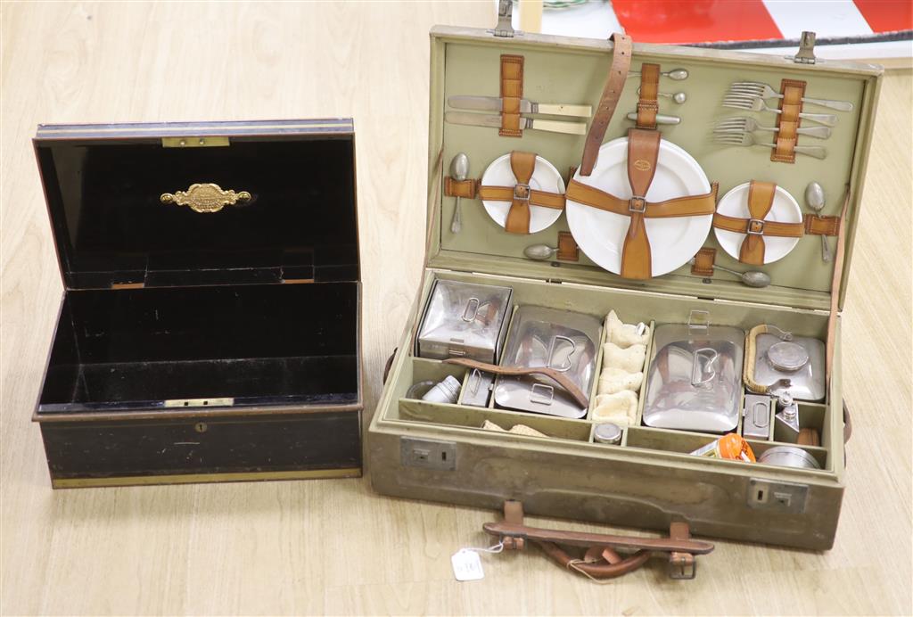 A 1930s picnic set, in a canvas covered case (incomplete)
